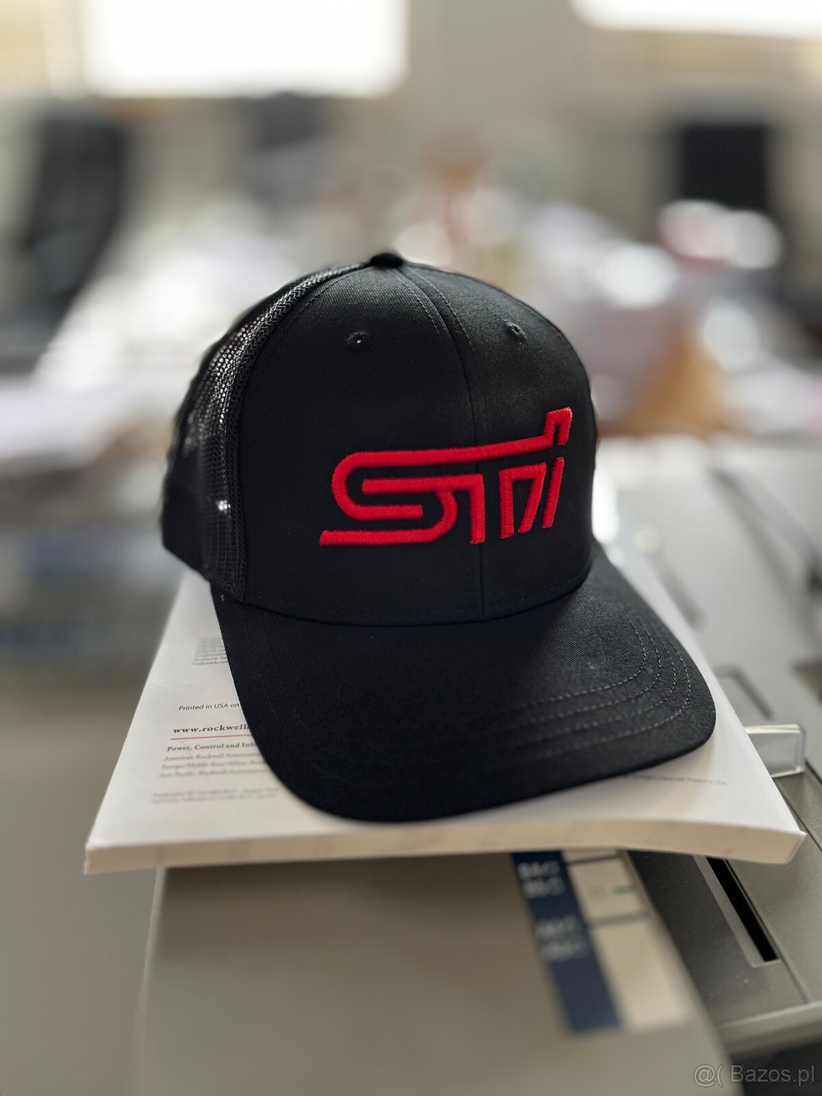I am selling a balck Subaru STi cap with 3D logo