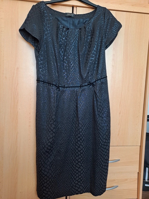 Czarna elegancka sukienka rozmiar 42 firmy Makalu