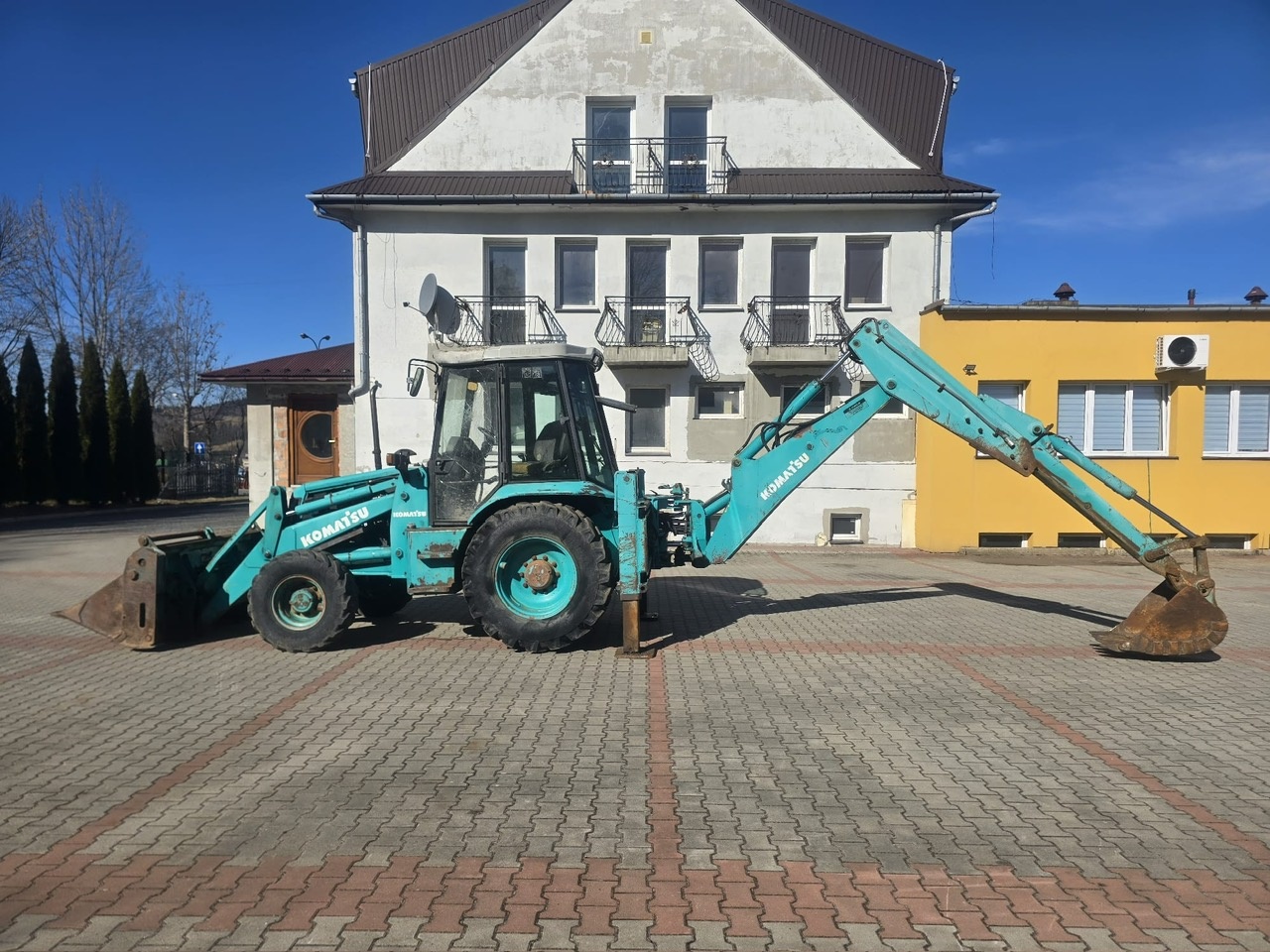 Koparko ładowarka Komatsu 95 - 10