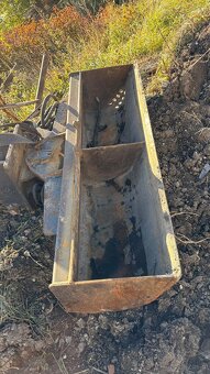 Koparko-ładowarka JCB 4CX - 11