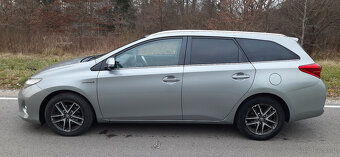 Toyota Auris 1.8 Hybryda 2014r 173 tyś km Kamera Hands-Free - 11