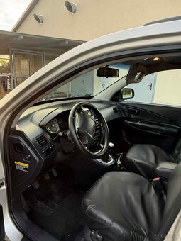 Hyundai Tuson 2.0 CRDI - 11