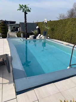 Dom z warsztatem serwisu ogumienia i basenem . Książenice gm - 12