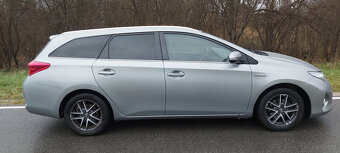 Toyota Auris 1.8 Hybryda 2014r 173 tyś km Kamera Hands-Free - 12