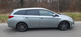 Toyota Auris 1.8 Hybryda 2014r 173 tyś km Kamera Hands-Free - 12