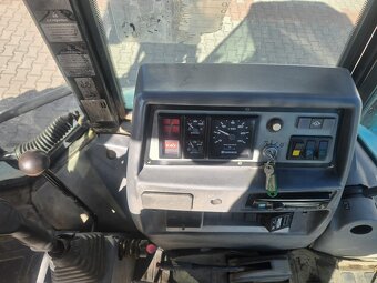 Koparko ładowarka Komatsu 95 - 14