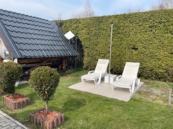 Dom z warsztatem serwisu ogumienia i basenem . Książenice gm - 16