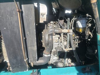 Koparko ładowarka Komatsu 95 - 16