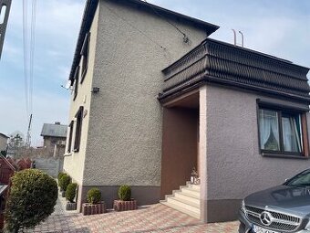 Dom z warsztatem serwisu ogumienia i basenem . Książenice gm