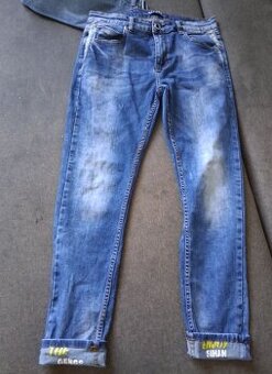 Spodnie jeansowe rozm L/33