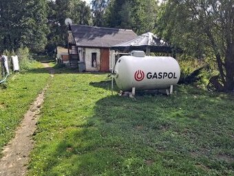 Sprzedam działkę z dwoma domami