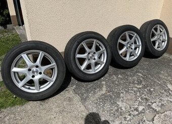 Komplet kół letnich Bridgestone + felgi aluminiowe Dezent 16
