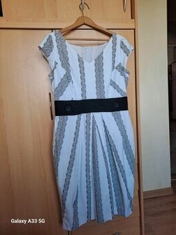 Ślicza sukienka rozmiar 46 firmy Vissavi