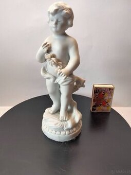 Stara sygnowana porcelana figura Putto
