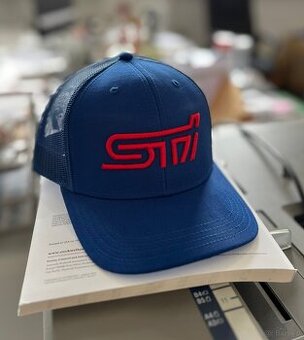 I am selling a blue Subaru STi cap with 3D logo Please wri
