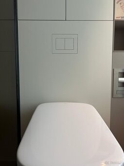 Ukryty przycisk spłukujący pod płytką SIGMA