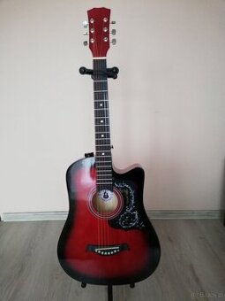 Sprzedam nowiutką gitarę akustyczną.