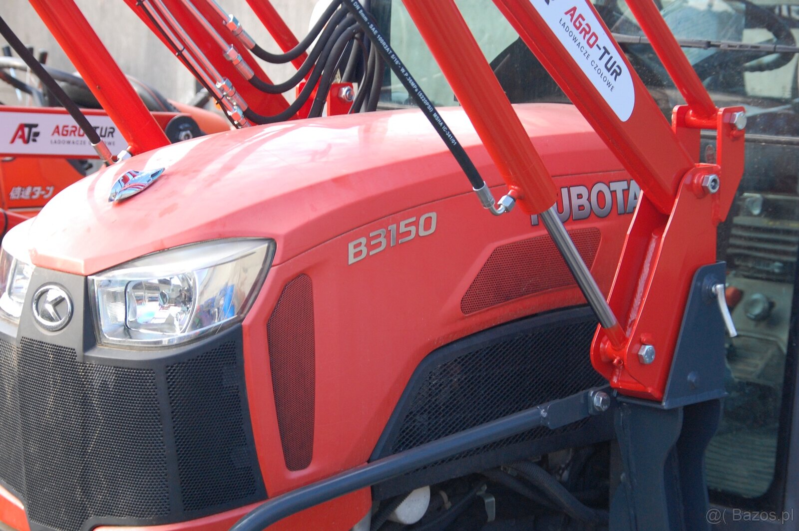 Ładowacz TUR z samopoziomowaniem, przeznaczony do traktora K - 2