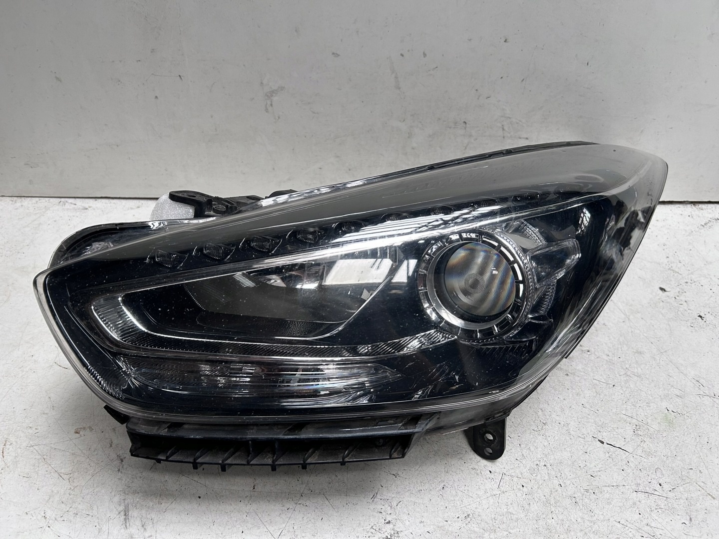 Reflektor lewy Hyundai I40 lift soczewka 921022SXXX - 2