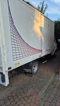 Mercedes-Benz 407 - 410 410D z windą Holland – solidny i got - 2