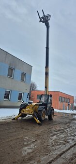 sprzedam ladowarka teleskopowa CAT 414 - 2