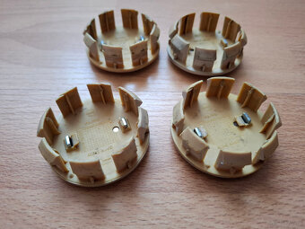 NISSAN 4 oryginalne dekieleki do felg 54mm - 3