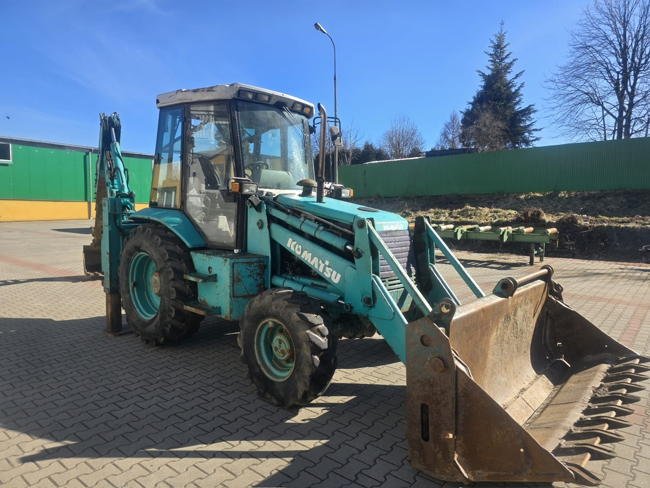 Koparko ładowarka Komatsu 95 - 4