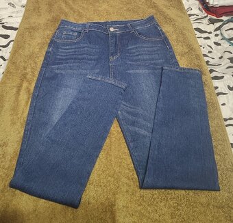 Dżinsy niebieskie, z guzikami na nogawkach, rozm. L - 4