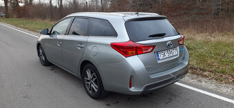 Toyota Auris 1.8 Hybryda 2014r 173 tyś km Kamera Hands-Free - 4