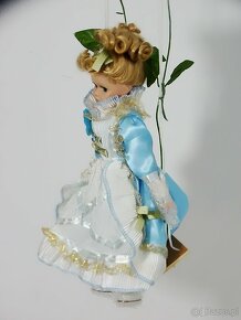 Porcelanowa laleczka dziewczynka na huśtawce - 4