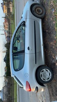 Peugeot benzyna 1.1 2002r - 4
