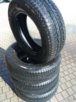 Opony 215/65/16 r 98 h m+s SNOWTOUR POWEPTRAC bieżnik ok 7 m - 5
