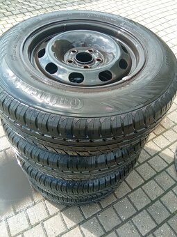 Oferuję używaną felgę stalową do samochodu marki z oponami o - 5