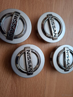 NISSAN 4 oryginalne dekieleki do felg 54mm - 5