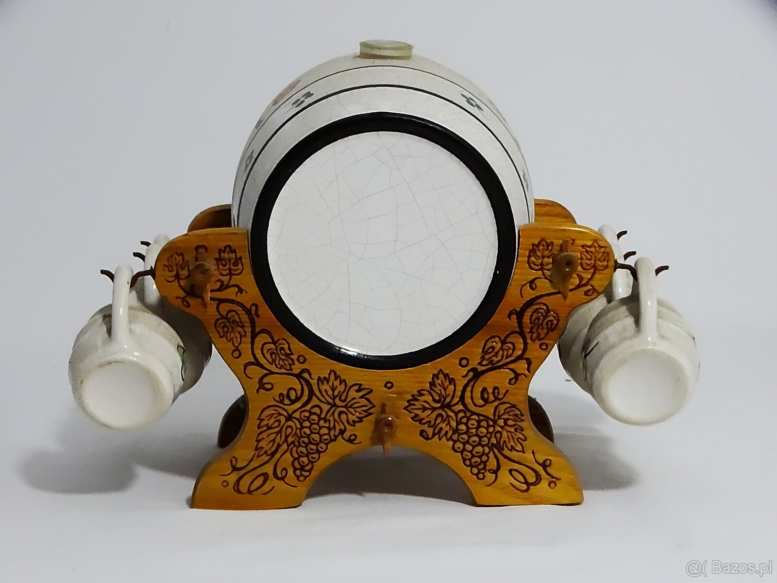 Dystrybutor w kształcie beczki, osadzony na rzeźbionym stoja - 6