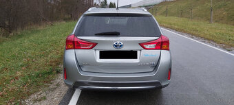 Toyota Auris 1.8 Hybryda 2014r 173 tyś km Kamera Hands-Free - 6
