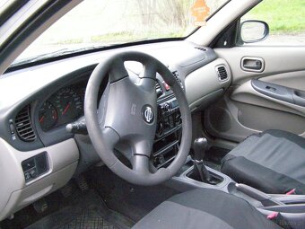 Nissan Almera 1,8 benzyna, rok 2002 - 7