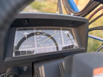 Iseki TA317 z ładowarka - 7