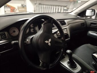 Tytuł: Mitsubishi Lancer: Mechaniczna Bestia z "blizną bojo - 8