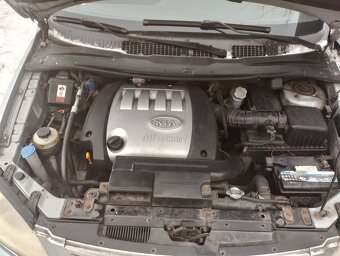 Kia carens 2 - 8