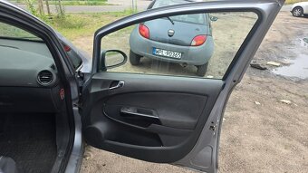 Opel Corsa D 1.2 16V Cosmo - 9